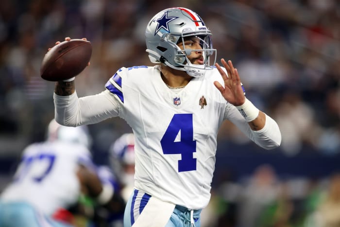 Nov 12, 2023; Arlington, Texas, USA; Dallas Cowboys quarterback Dak Prescott (4) throws a pass in the second quarter against the New York Giants at AT&T Stadium. Mandatory Credit: Tim Heitman-USA TODAY Sports